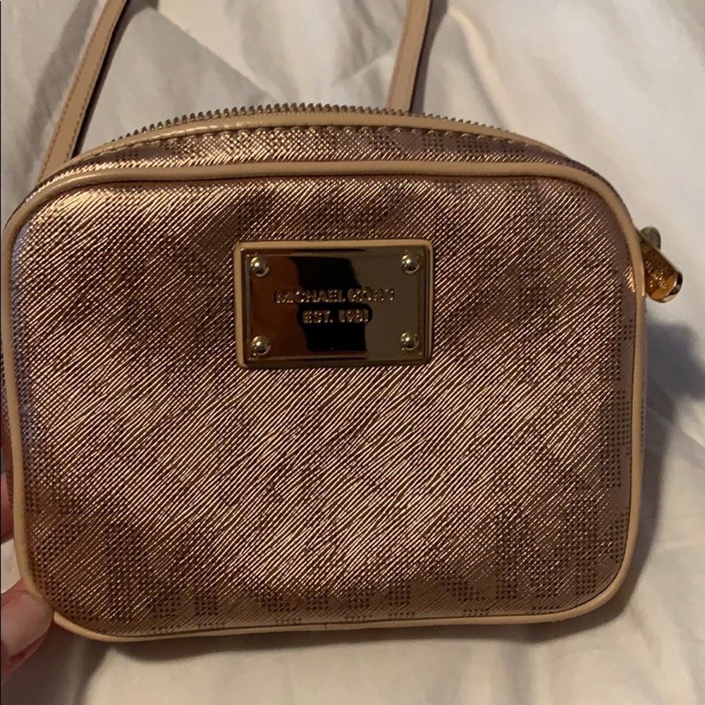 Metallic RoseGold Michael Kors crossbody 5”x6.5”